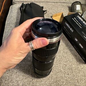 Coffee mug that looks like a camera lens